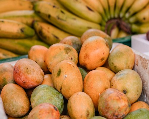 Assortment of common Colombian fruits like mango, pineapple, and banana